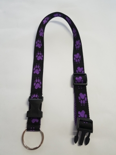 Palkar obojok z popruhu pre psov 65 cm x 25 mm čierno-fialová s labkami