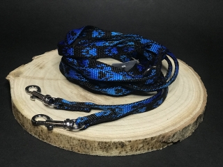 Palkar vodítko prepínacie z popruhu pre psov 250 cm x 10 mm čierno-modrá s labkami