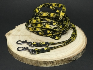 Palkar vodítko prepínacie z popruhu pre psov 250 cm x 10 mm čierno-žlté labky