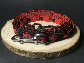 Palkar vodítko prepínacie z popruhu pre psov 250 cm x 16 mm čierno-červená s labkami