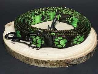 Palkar vodítko prepínacie z popruhu pre psov 250 cm x 20 mm čierno-zelená s labkami