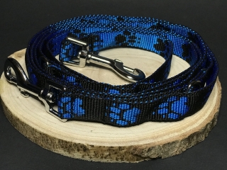 Palkar vodítko prepínacie z popruhu pre psov 250 cm x 20 mm čierno-modrá s labkami