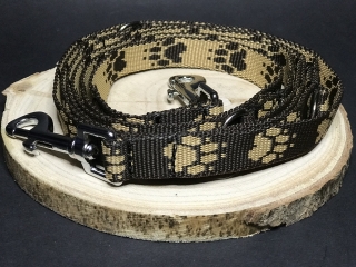 Palkar vodítko prepínacie z popruhu pre psov 250 cm x 20 mm čierno-hnedá s labkami