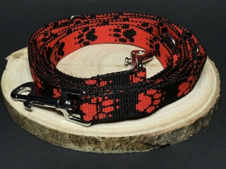 Palkar vodítko prepínacie z popruhu pre psov 250 cm x 20 mm čierno-červená s labkami