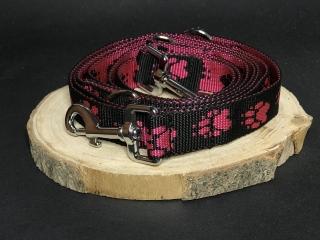 Palkar vodítko prepínacie z popruhu pre psov 250 cm x 25 mm čierno-ružová s labkami